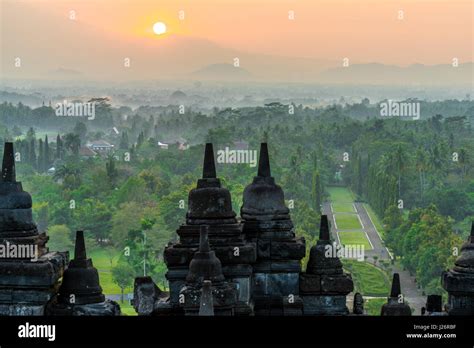 9th century Stone Stupa during sunrise at Borobudur Buddhist temple ...