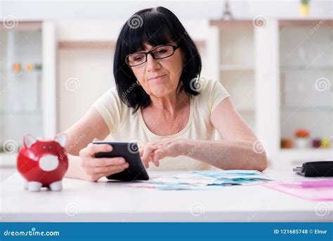 The Mature Woman Trying To Reconcile Her Bills Stock Photo Image Of