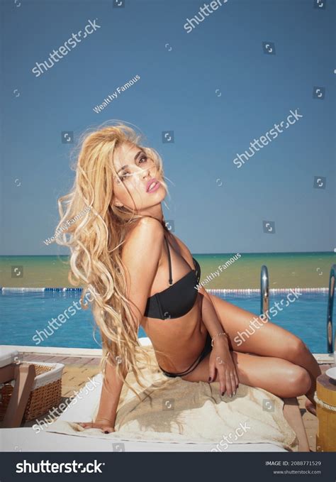 Sexy Slender Blonde Girl Black Swimsuit Stock Photo Shutterstock