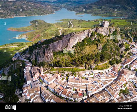 Picturesque Aerial View Of Zahara De La Sierra With Ancient Castle On