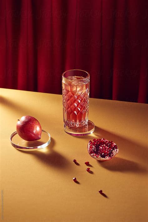 Glass Of Pomegranate Juice And Fresh Fruits On Table By Stocksy Contributor Marc Tran Stocksy