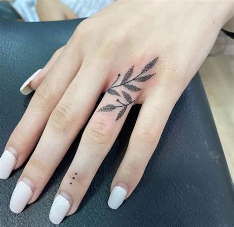 Share 82+ small flower finger tattoos best - in.cdgdbentre