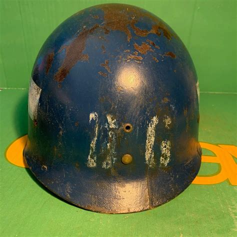 Need help! Identifying external markings on M1 helmet liner