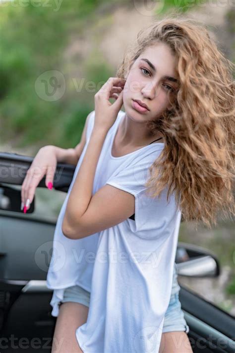 Attractive Blonde Caucasian Female Model Posing Outside Stock Photo At Vecteezy
