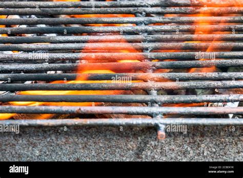 Empty Hot Charcoal Barbecue BBQ Grill With Burning Fire With Flame And Smoke Hot Coal Made Of