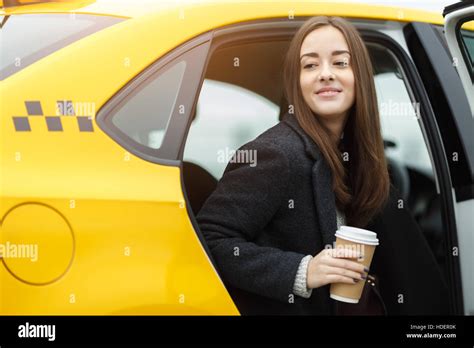 Beautiful Brunette Sitting In Cab Stock Photo Alamy