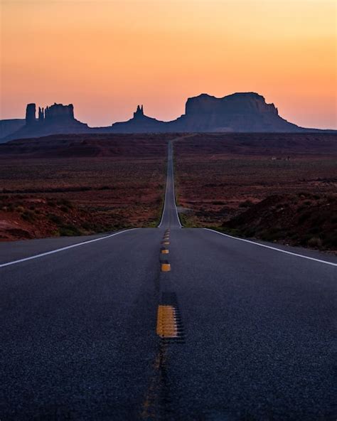 Premium Photo The Iconic View Of Monument Valley As Seen From Forrest