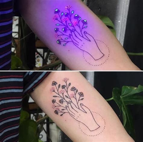 Two Tattoos That Have Different Designs On Their Arms And Hands One