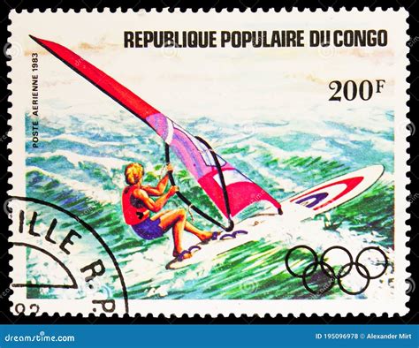 Postage Stamp Printed In Congo Shows Windsurfer Windsurfing Serie