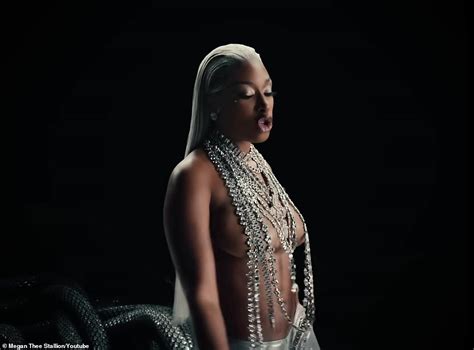 Megan Thee Stallion Is Nearly Naked In Silver Chains And Sheer Catsuit