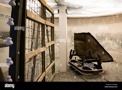 Barbed Wire Fence And Cart In Oskar Schindler S Factory Krakow Poland