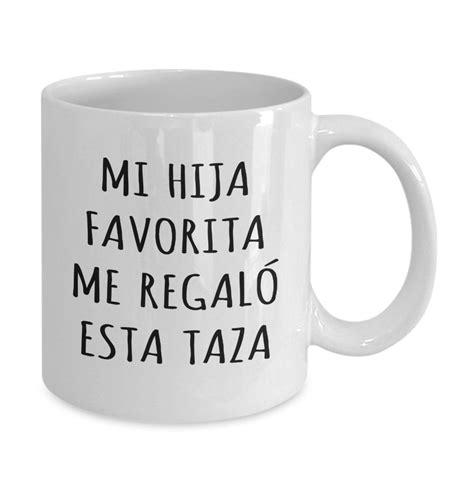 A White Coffee Mug With The Words Mr Hermana Favorite Me Regalo Est Taza