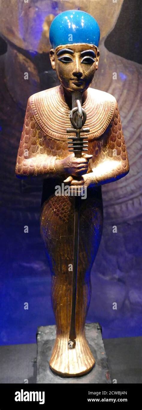 Gilded Wooden Statue Of The God Ptah Wearing A Cobalt Blue Glass Cap