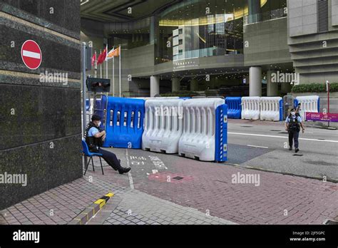 Hong Kong China 29th June 2022 A Policeman Sits And Guards The