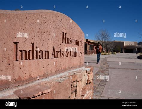 A Tourist Visits The Museum Of Indian Arts And Culture In Santa Fe New