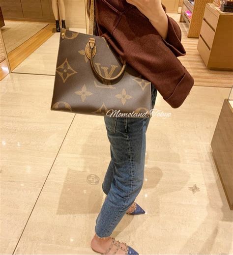 The Smaller Louis Vuitton OntheGo MM Bag Guide 2022 Spotted Fashion