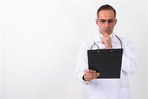 Premium Photo Portrait Of Mature Handsome Persian Man Doctor