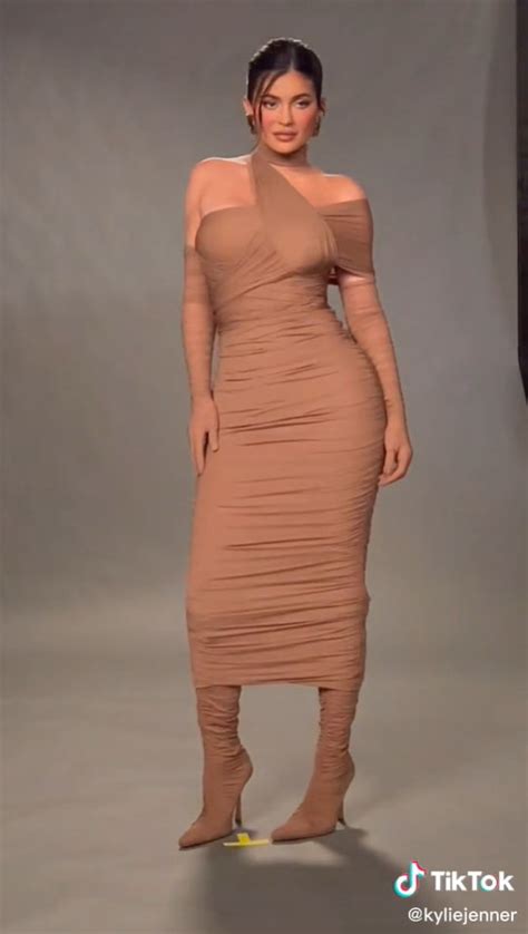 Kylie Jenner Shows Off Her Incredible Post Baby Curves In Skintight Nude Dress In Sexy Video