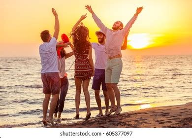 Young People Dancing On Beach Sunset Stock Photo 605377097 | Shutterstock