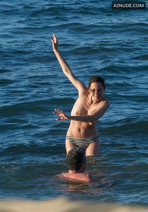 Marion Cotillard Shows Her Tits On The Beach In Fuerteventura Aznude