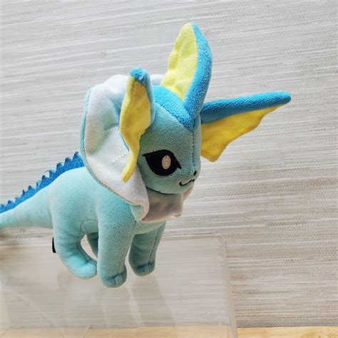 Mavin Pokemon Center Vaporeon Water Type Eevee Evolution Blue