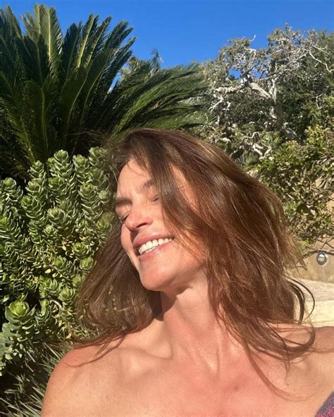 Cindy Crawford Posts Sexy Shots In Robe And Trench Coat To Mark First Photo Dump Of 2023