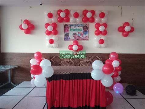 Red And White Balloon Decoration At Home With Name Board Catering