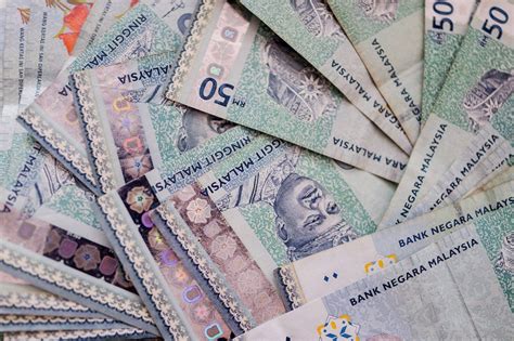 Ringgit Opens Slightly Higher Vs US Dollar