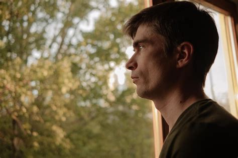 Premium Photo Portrait Of A Man 35 39 Years Old Looks Out The Window