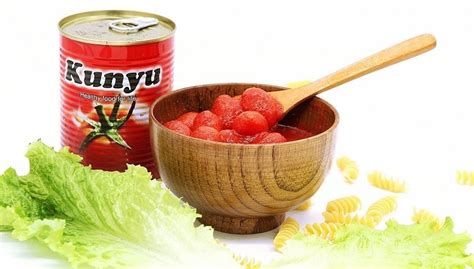 China Canned Tomato Peeled Tomato In Tomato Juice Manufacturers