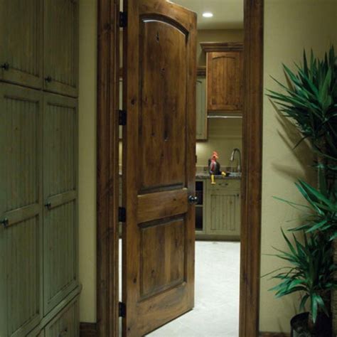 Krosswood Doors 24 In X 80 In Rustic Knotty Alder 2 Panel Top Rail Arch Solid Wood Core Right