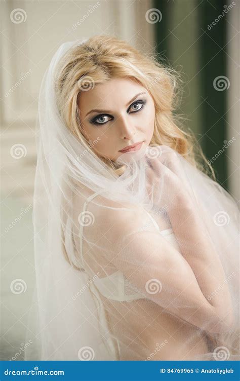 Beautiful Bride Is Wearing Lingerie And Veil On Wedding Day Stock Image Image Of Portrait