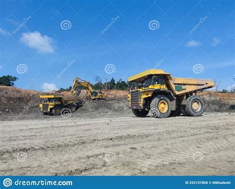 Excavator And Dump Truck Working In Coal Mine Area Stock Photo Image