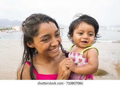 Long Haired Brunette Holding Her Baby Outside Images Stock Photos D Objects Vectors