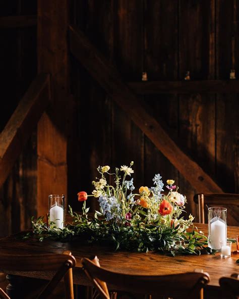 Meadowstabletop Down The Aisle In Front Of The Sweetheart Table On