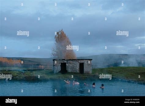 Secret Lagoon Hot Spring Fl Ir Iceland A Popular Tourist Attraction Stock Photo Alamy