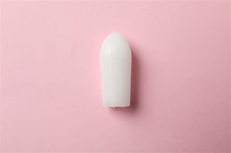 Premium Photo Anal Or Vaginal Candle On Pink Close Up