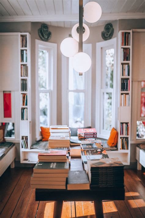 Books on Brown Wooden Table · Free Stock Photo