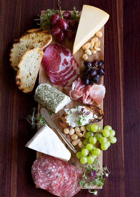 How To Put Together A Great Cheese And Charcuterie Board Charcuterie And Cheese Board Food