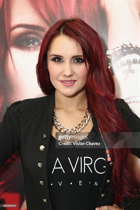 Singer Dulce Maria attends a press conference and photo call to... News ...