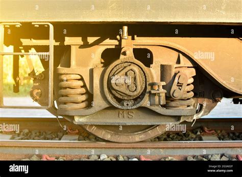 Industrial rail car wheels closeup photo ,train wheel Stock Photo - Alamy