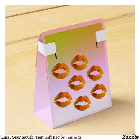 A Paper Bag With Orange Lips On It