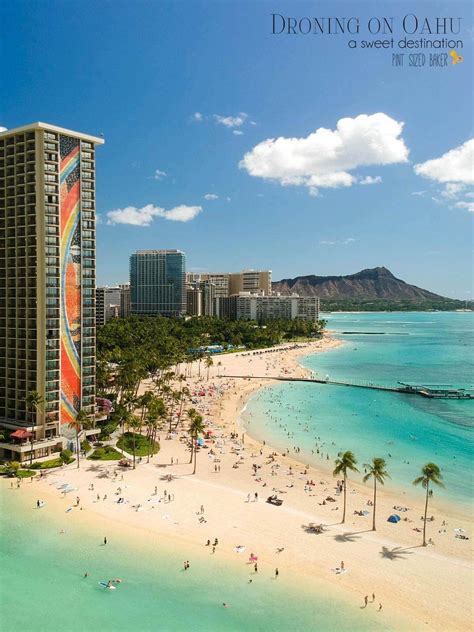 The Hilton Hawaiian Village With Its Iconic Rainbow Tower Overlooks