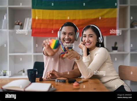 A Charming And Cheerful Asian Gay Radio Host Enjoys Chatting While