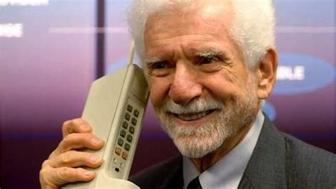 Inventor Martin Cooper Holding His Creation Many Years Later The Original Cell Phone Made By