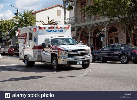 Downtown Fairhope Alabama Usa An Ambulance On An Emergency Call