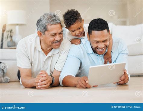 Love Never Fails A Mature Man Laying With His Son And His Grandson On