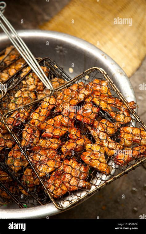 Preparing grilled pork as part of Bun Cha Street food, Old Quarter, Hanoi, Vietnam Stock Photo ...