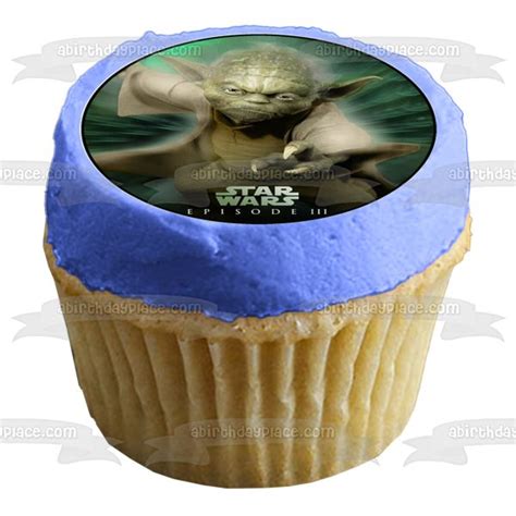 A Star Wars Yoda Cupcake With Blue Frosting On Top And An Image Of The