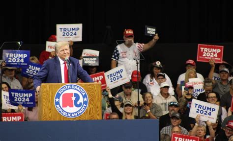 Trump rally highlights Republican division with booing of absent Thune ...